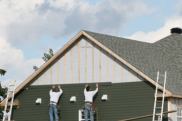 Professional Vinyl Siding technician working in Sherborn, MA